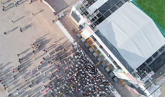 Aerial view of outdoor stage with audience
